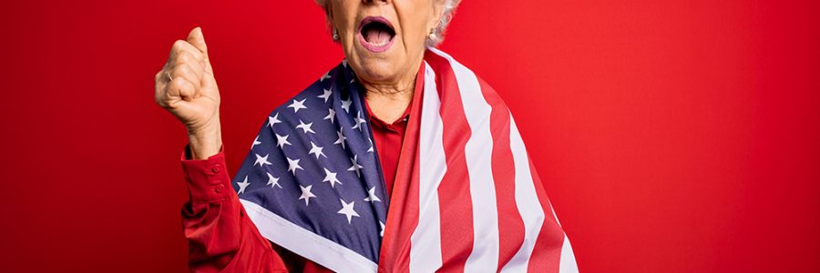 Senior beautiful grey-haired patriotic woman wearing united states flag over red background screaming proud and celebrating victory and success very excited, cheering emotion